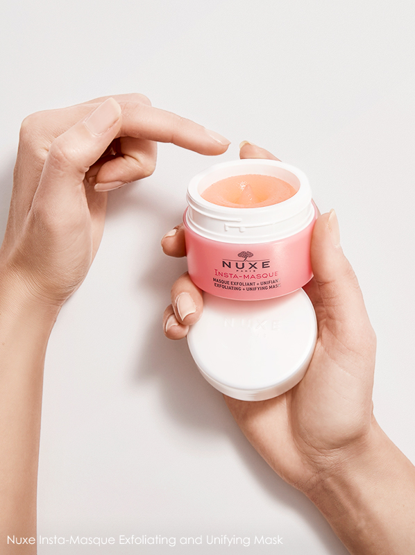  Image of Nuxe Insta-Masque Exfoliating and Unifying Mask held in hand