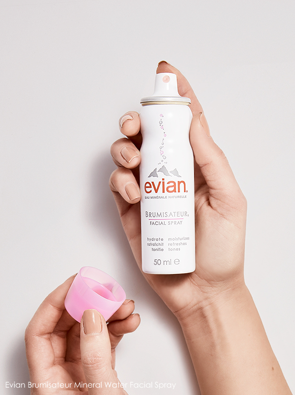 Image model holding of The Evian Facial Spray