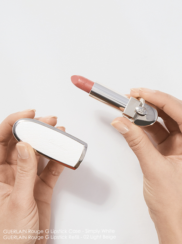 Image of Guerlain Rouge G Simply White Lipstick Case and Rouge G 02 Light Beige lipstick being held in hands