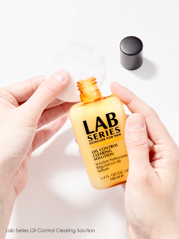 Skincare gifts for men: Hand swatch image of Lab Series Oil Control Clearing Solution