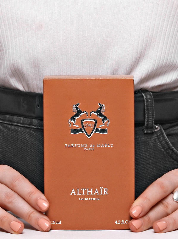 Chelsey holding Parfums de Marly Althair for perfume review showing the outer box